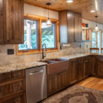 Rustic hickory kithen cabinets with brown stain