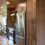 Rustic hickory kithen cabinets with brown stain