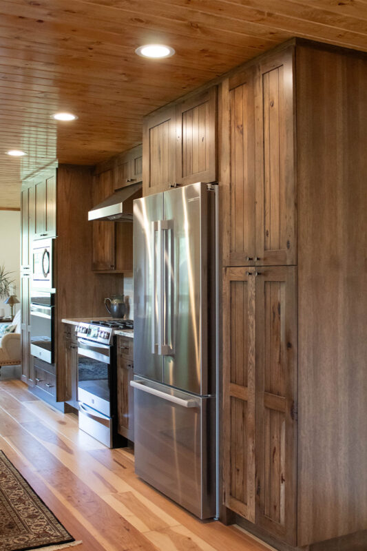 Rustic hickory kithen cabinets with brown stain