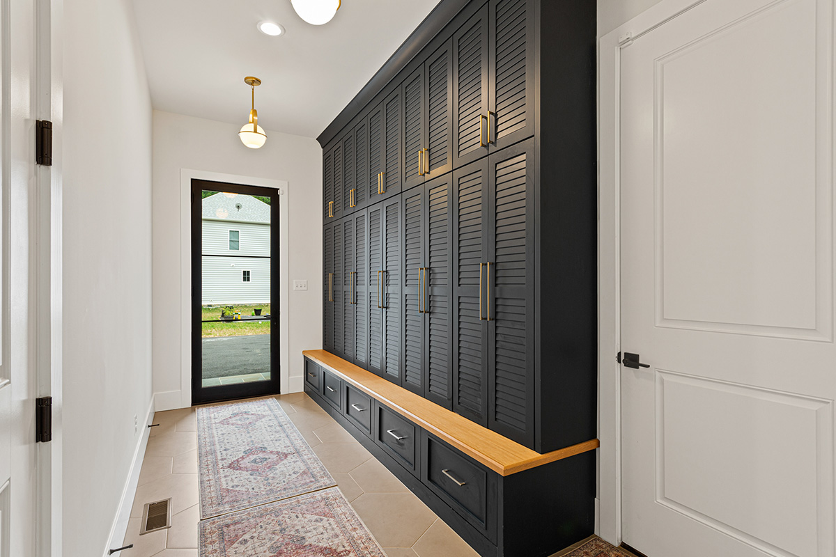 Dark stained mudroom storage cabinets