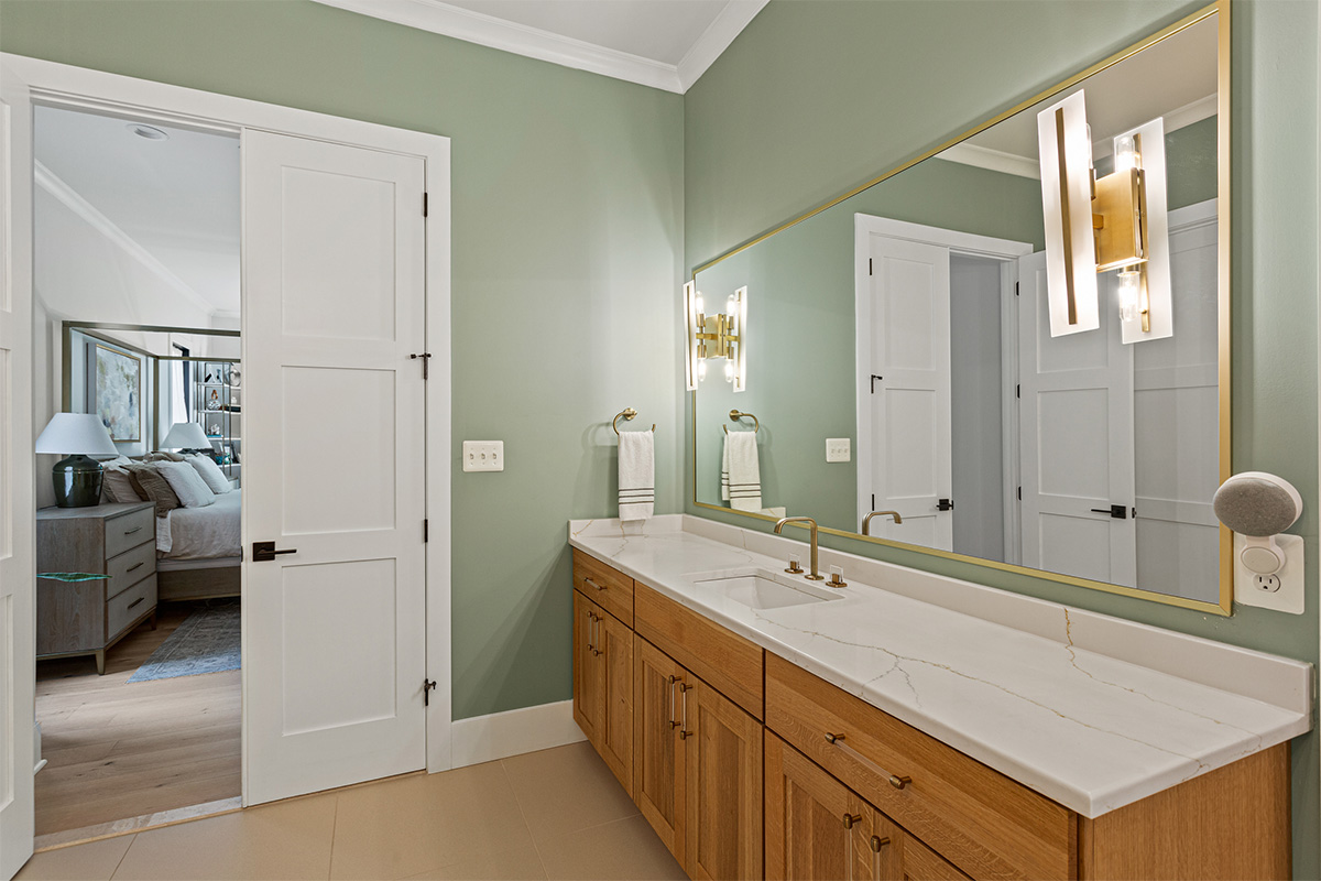 Light stained bathroom vanity cabinet