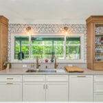 Painted and stained kitchen cabinets.