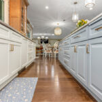 Painted and stained kitchen cabinets.