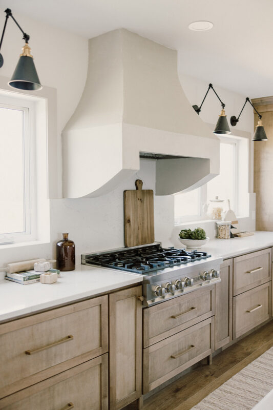 kitchen with painted island and stained perimeter.