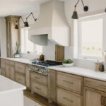 kitchen with painted island and stained perimeter.