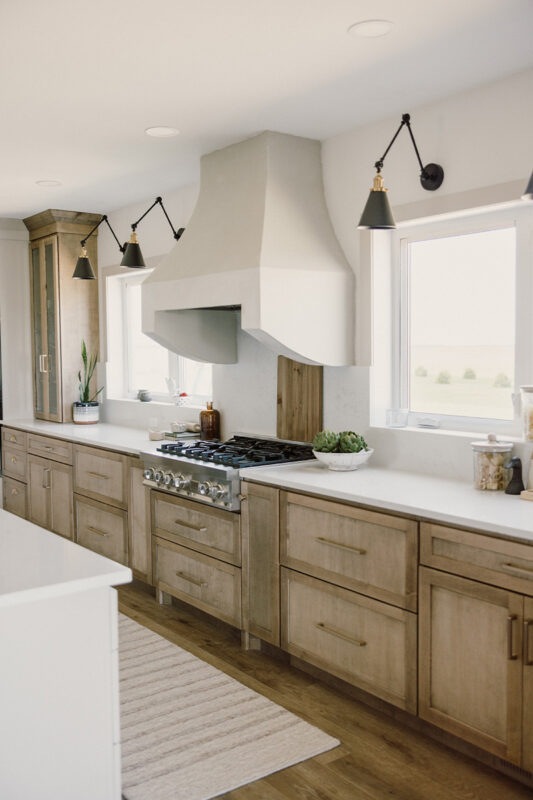 kitchen with painted island and stained perimeter.