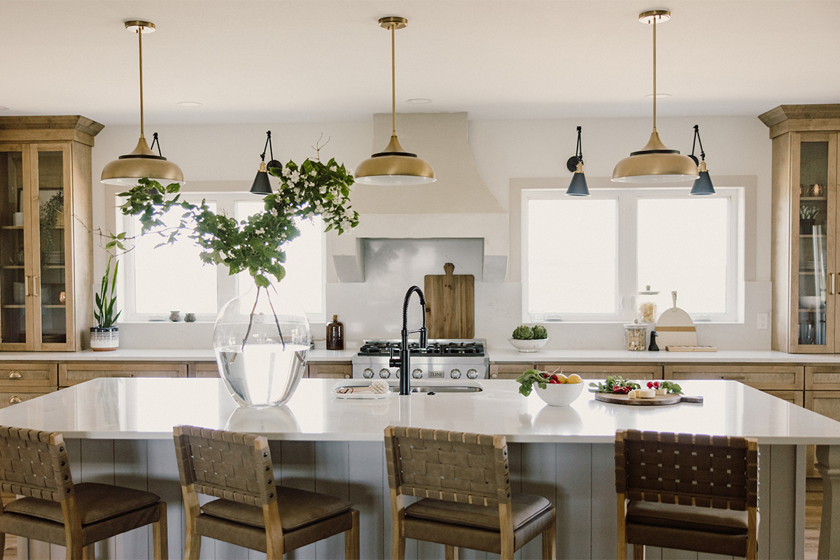 kitchen with painted island and stained perimeter.