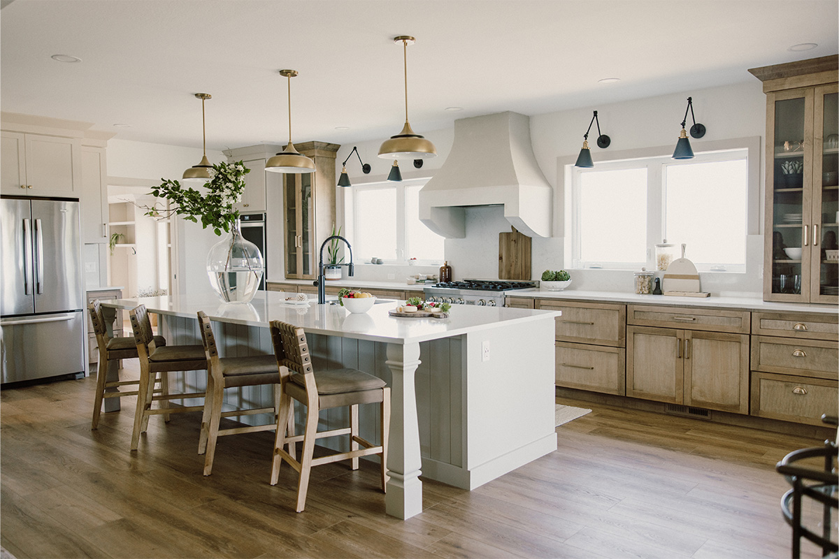 kitchen with painted island and stained perimeter.