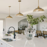 kitchen with painted island and stained perimeter.