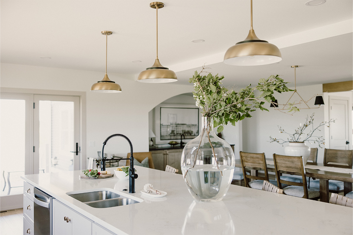 kitchen with painted island and stained perimeter.