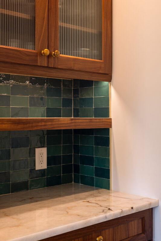 Walnut cabinet with glass doors