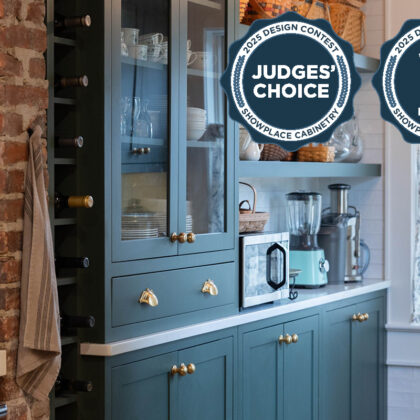 Purple painted bar cabinets with wine bottles and open shelves. Includes badge notifying that this project is a design contest winner.