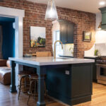 Purple painted kitchen island cabinets.