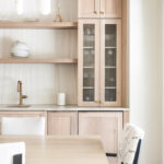 Light stained dining room serving station.