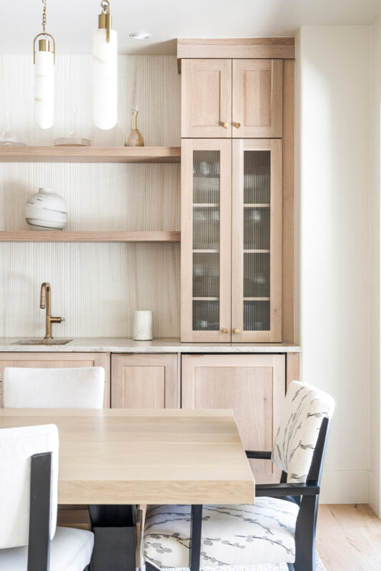 Light stained dining room serving station.