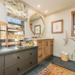 Stained and brown painted bathroom cabinets