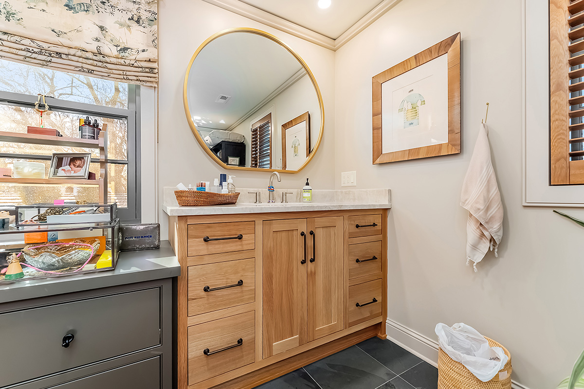 Stained and brown painted bathroom cabinets