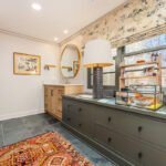 Stained and brown painted bathroom cabinets