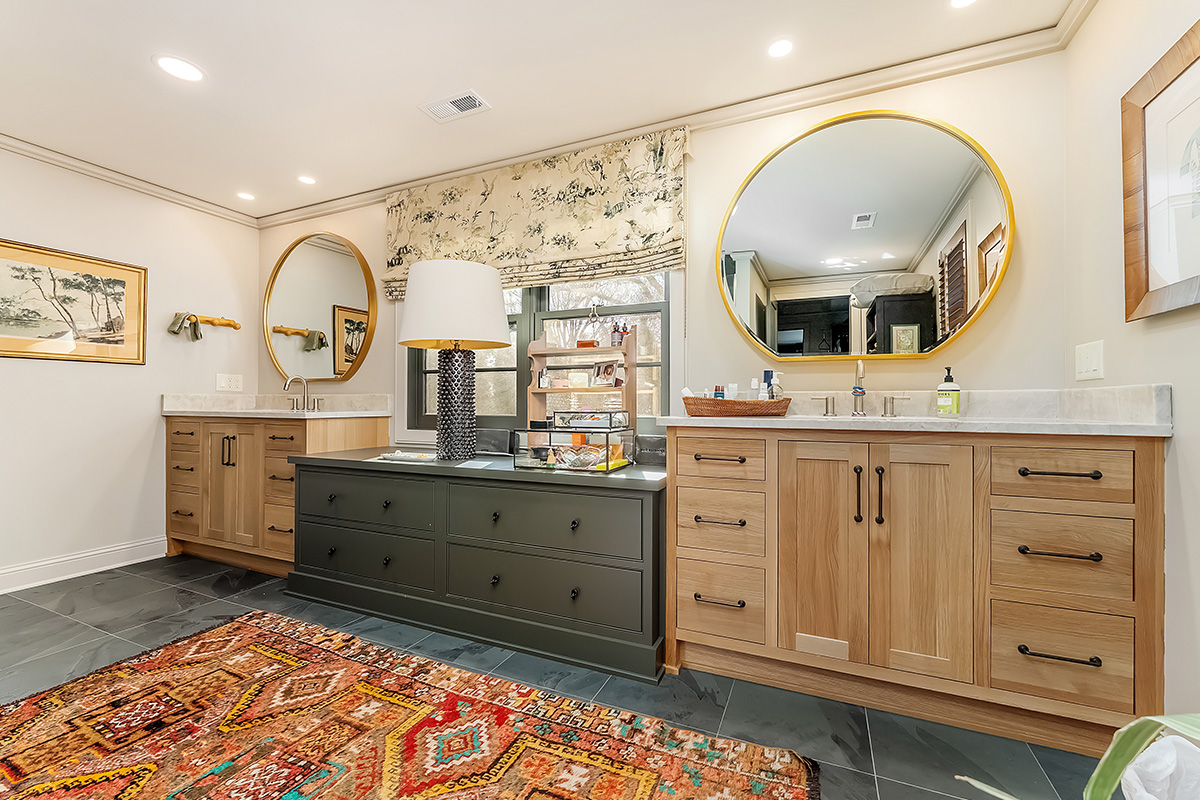 Stained and brown painted bathroom cabinets