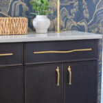 Dark stained cherry bar cabinets.