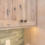 Light stain on perimeter kitchen cabinets