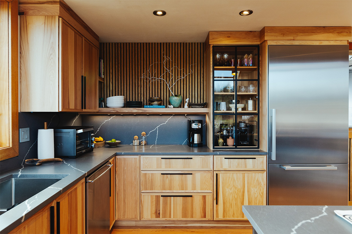 Natural hickory kitchen with black countertop