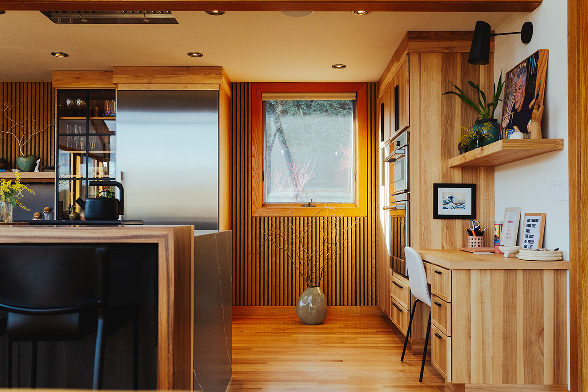 Natural hickory kitchen with black countertop