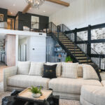 Dark stained hickory bar cabinets under a staircase