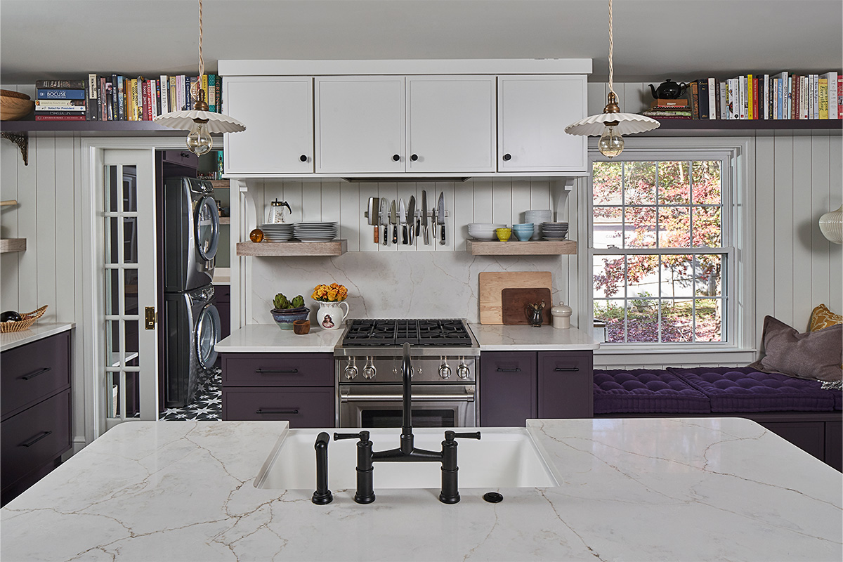 White and purple painted kitchen cabinets.