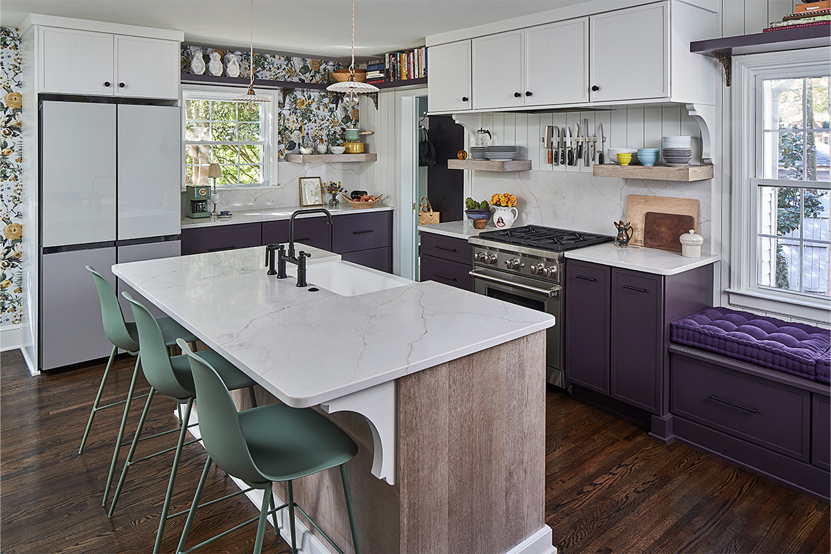 White and purple painted kitchen cabinets with stained hickory island cabinets.
