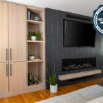 Dark brick fireplace with TV above and light stained cabinets on both sides.