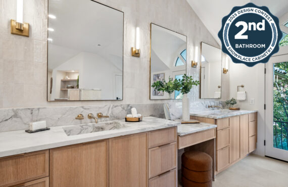 Double light brown bathroom vanities with powder desk in between.