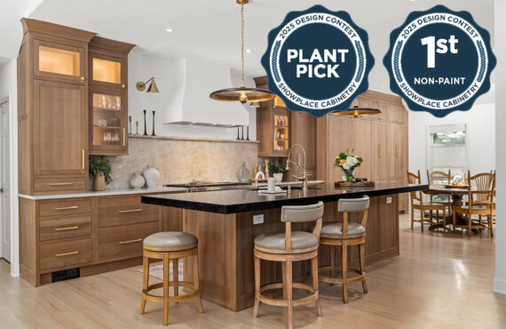 Stained white oak kitchen with a white hood.