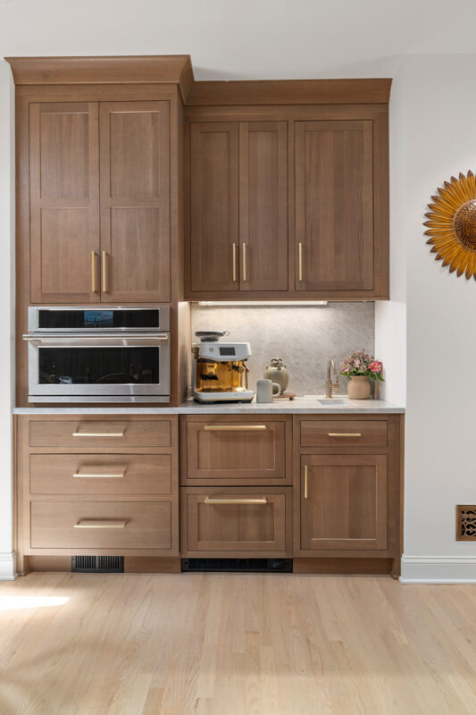 Stained white oak kitchen cabinets.