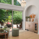 Stained white oak cabinet in a living room space.