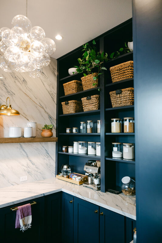 Blue and white kitchen with cabinets
