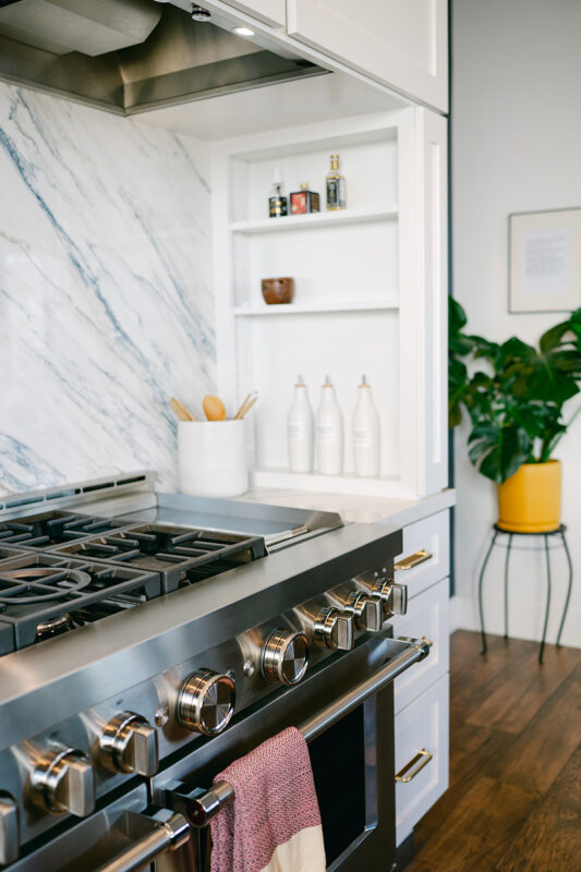 Blue and white kitchen with cabinets
