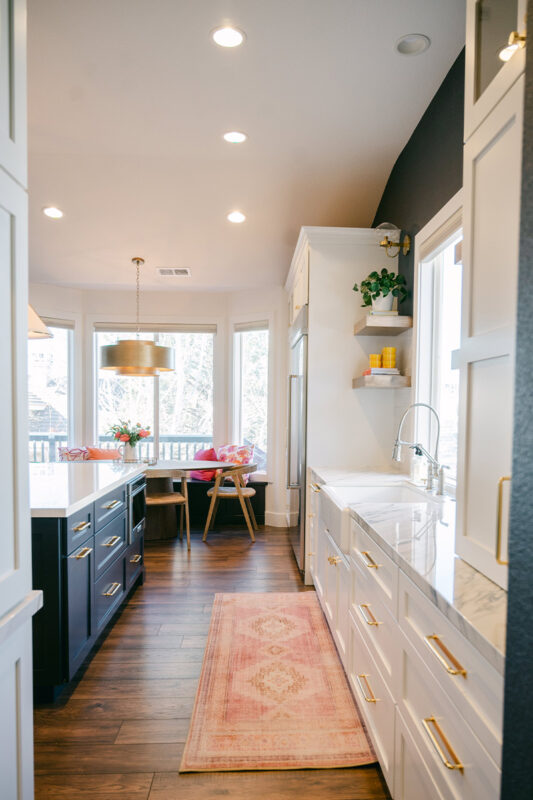 Blue and white kitchen with cabinets