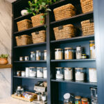 Blue and white kitchen with cabinets
