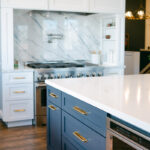 Blue and white kitchen with cabinets