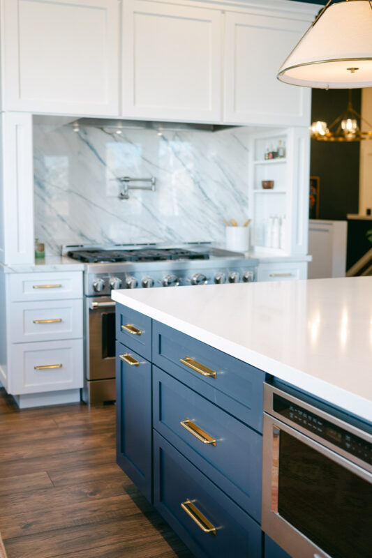 Blue and white kitchen with cabinets