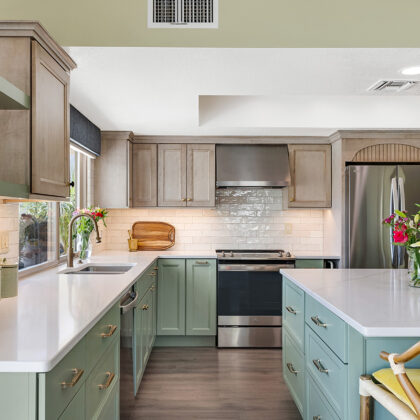 Light green and light brown stained kitchen