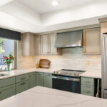 Light green and light brown stained kitchen