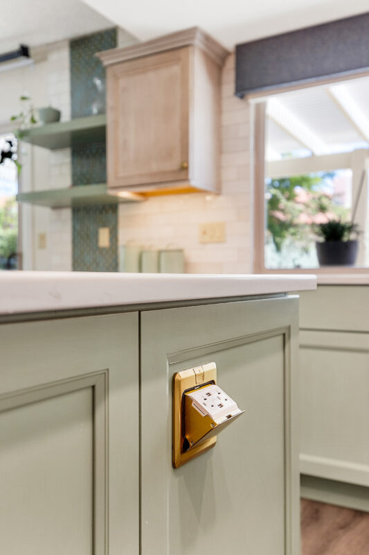 Light green and light brown stained kitchen