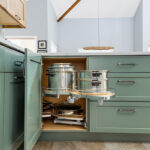 Light brown and painted gray kitchen