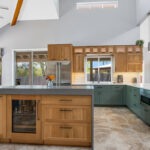 Light brown and painted gray kitchen