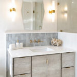 Large master bathroom with 2 vanity areas with light Montana stain, powder desk.