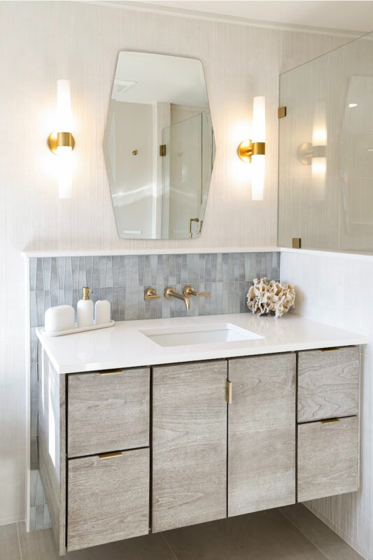 Large master bathroom with 2 vanity areas with light Montana stain, powder desk.