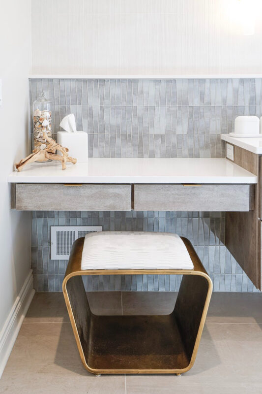 Large master bathroom with 2 vanity areas with light Montana stain, powder desk.