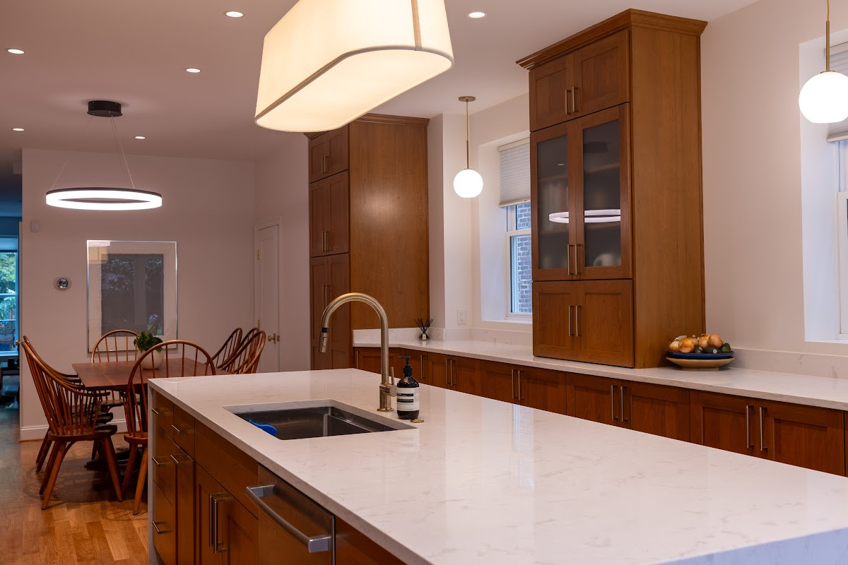 Cherry kitchen cabinets with a red Sienna stain. The layout is only one wall cabinet (intalled on countertop) installed.